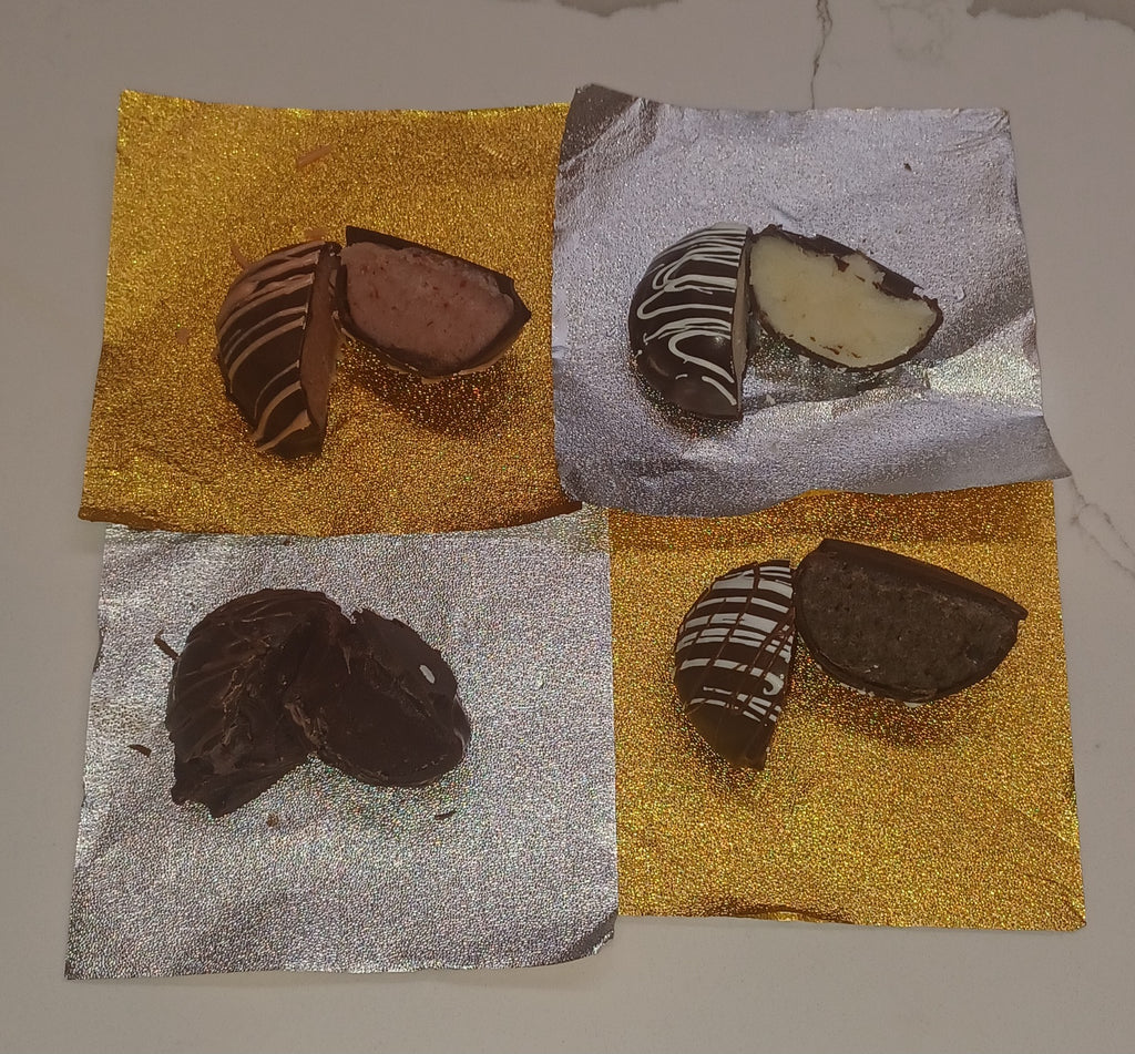 Caja de tarta de queso bañada en chocolate y trufas